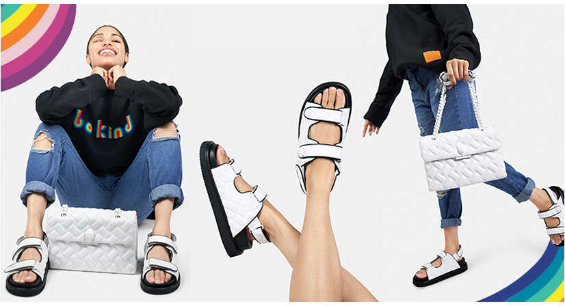 Jessica modelling the white orson sandals
